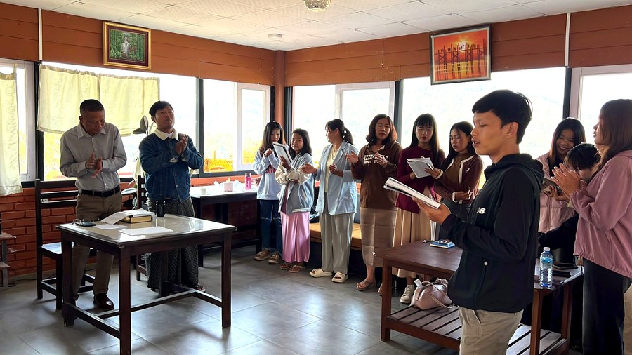 Leading a discipleship training session in Myanmar