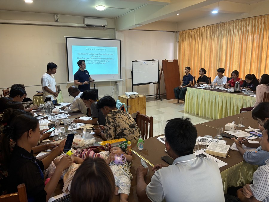 A leader teaching at a discipleship training gathering in Myanmar